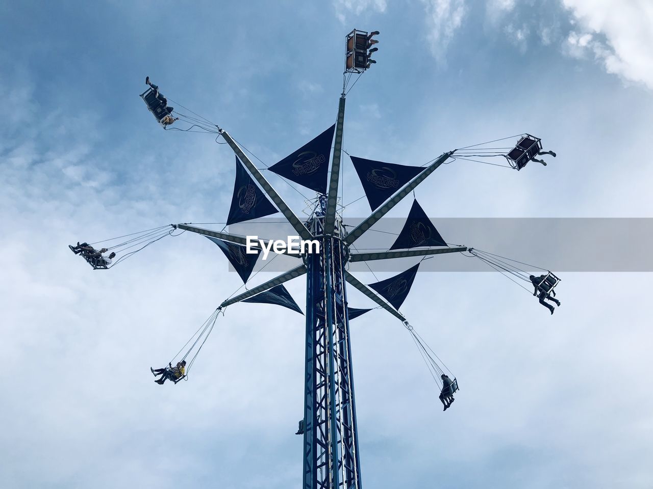 LOW ANGLE VIEW OF CHAIN SWING RIDE