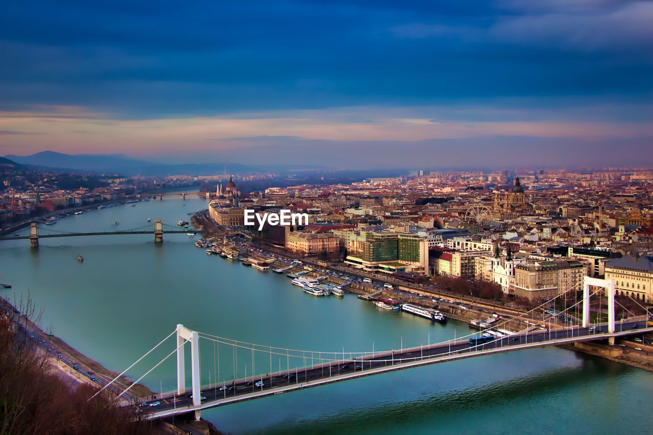 High angle view of bridge over river against cloudy sky