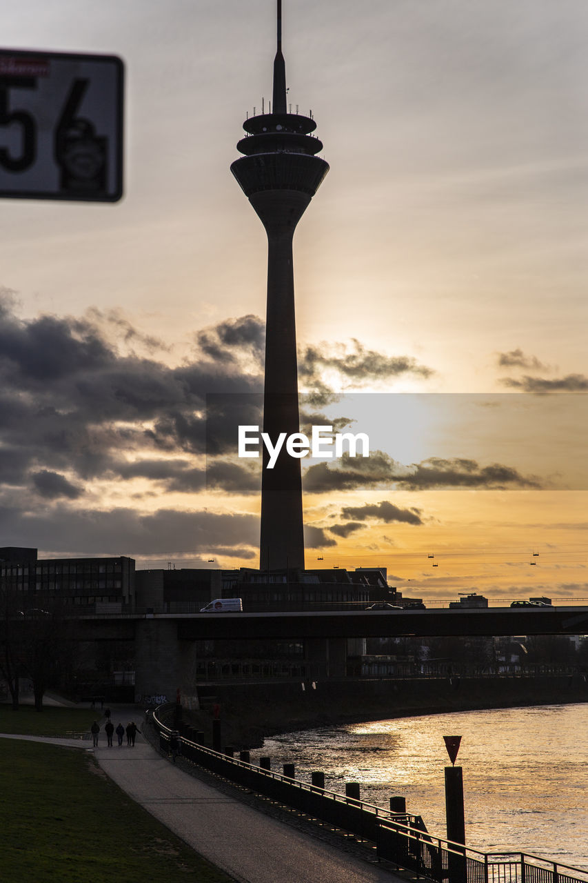 SILHOUETTE OF TOWER AT SUNSET