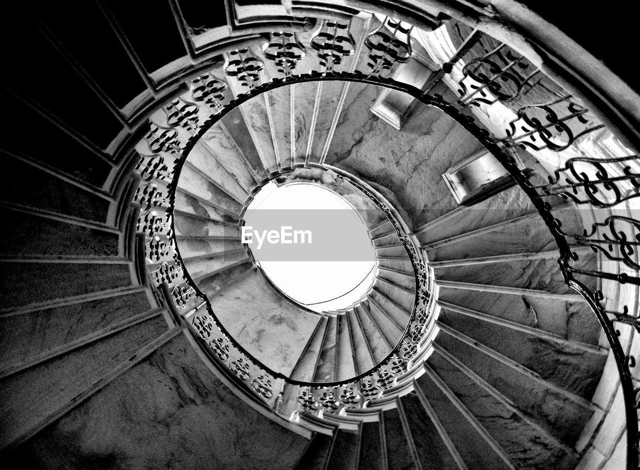 Low angle view of spiral stairs against clear sky