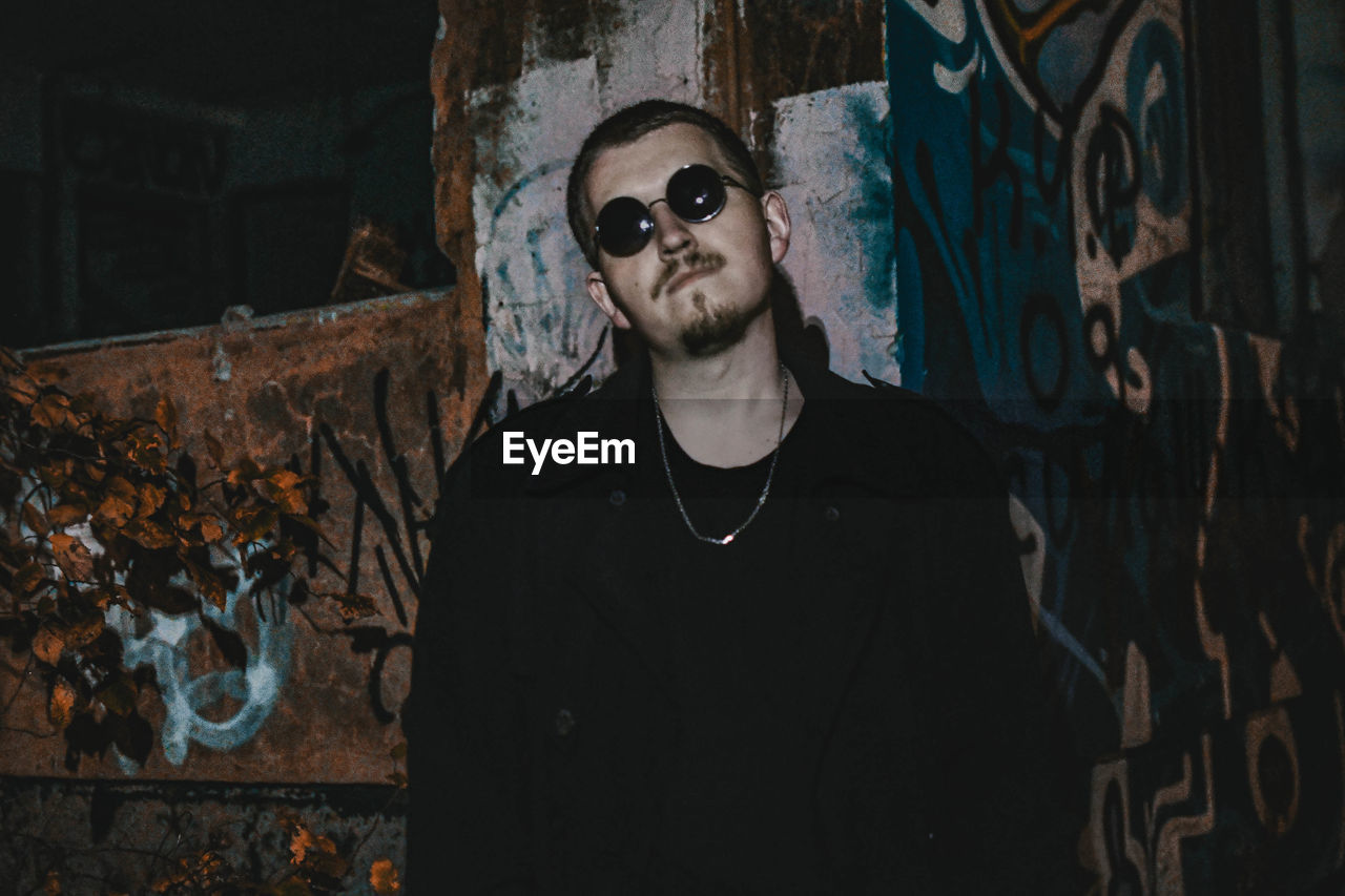 Portrait of young man wearing sunglasses