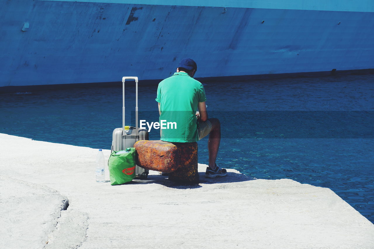 Rear view of man on seashore