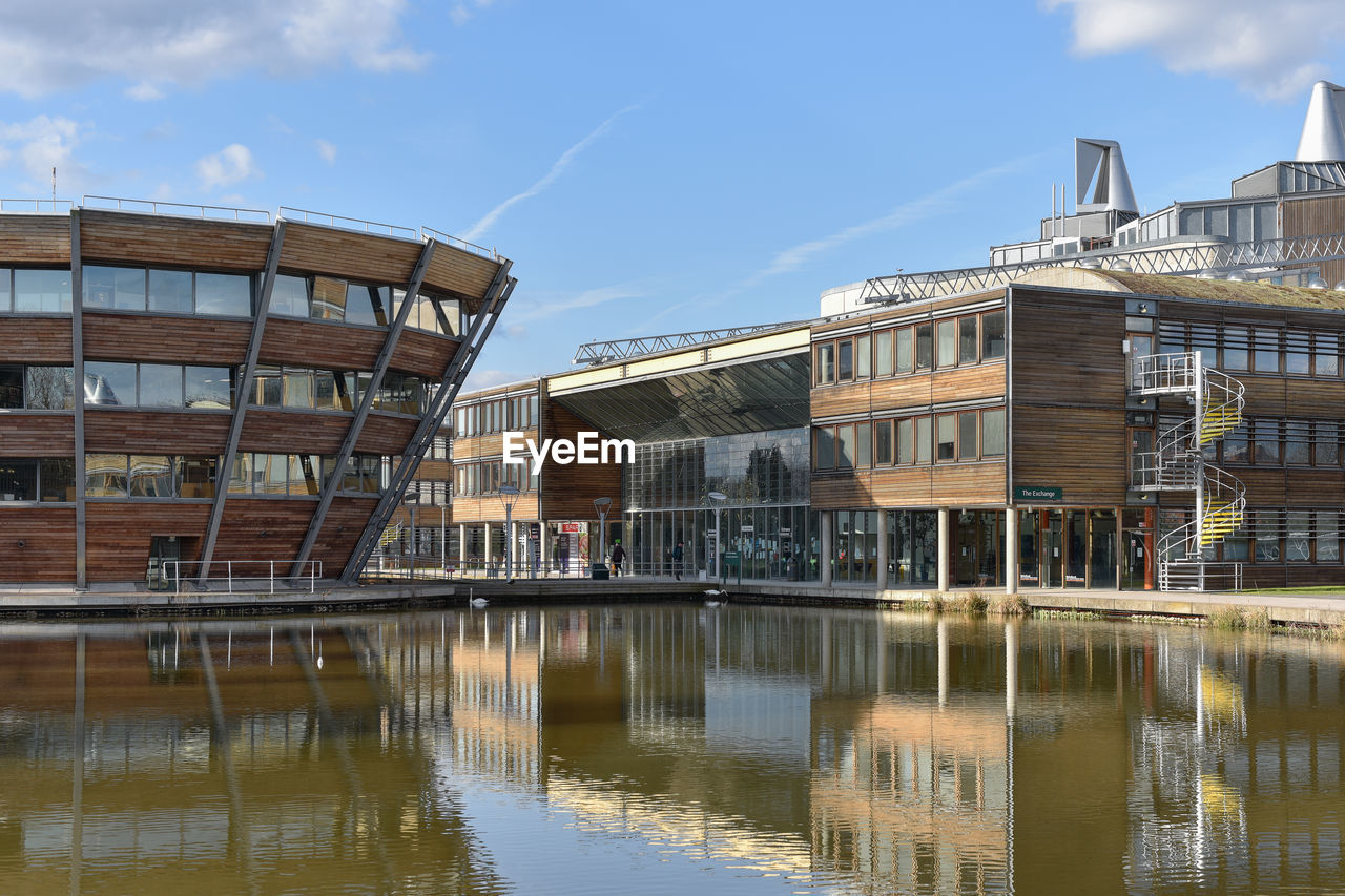 River amidst buildings in city