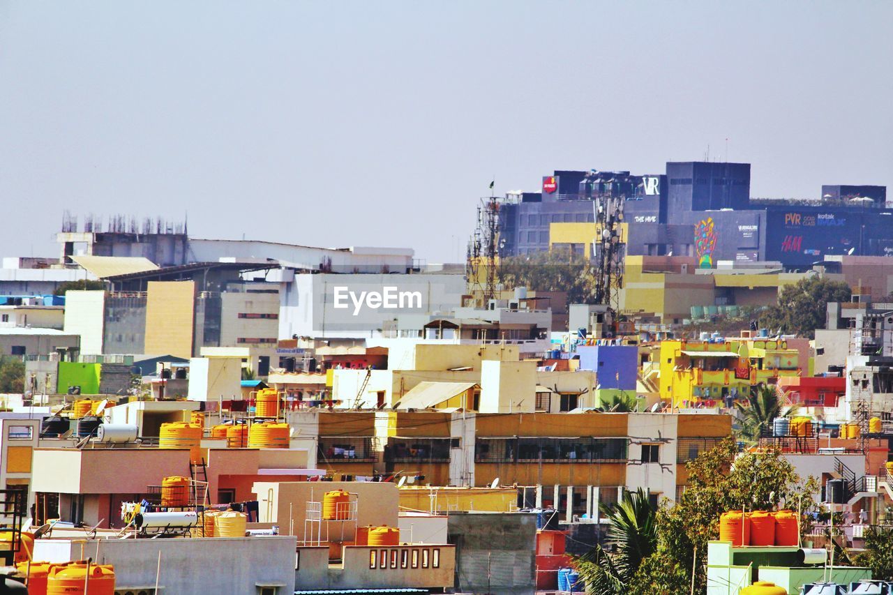 BUILDINGS AGAINST CLEAR SKY