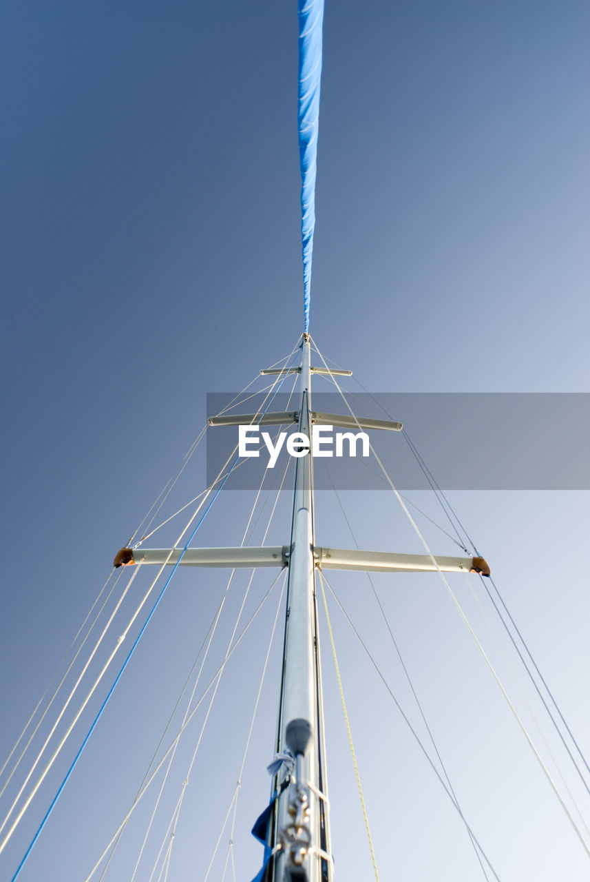 Low angle view of mast against clear sky