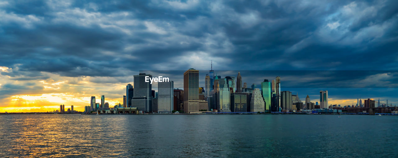 Panoramic lower manhattan skyline at sunset