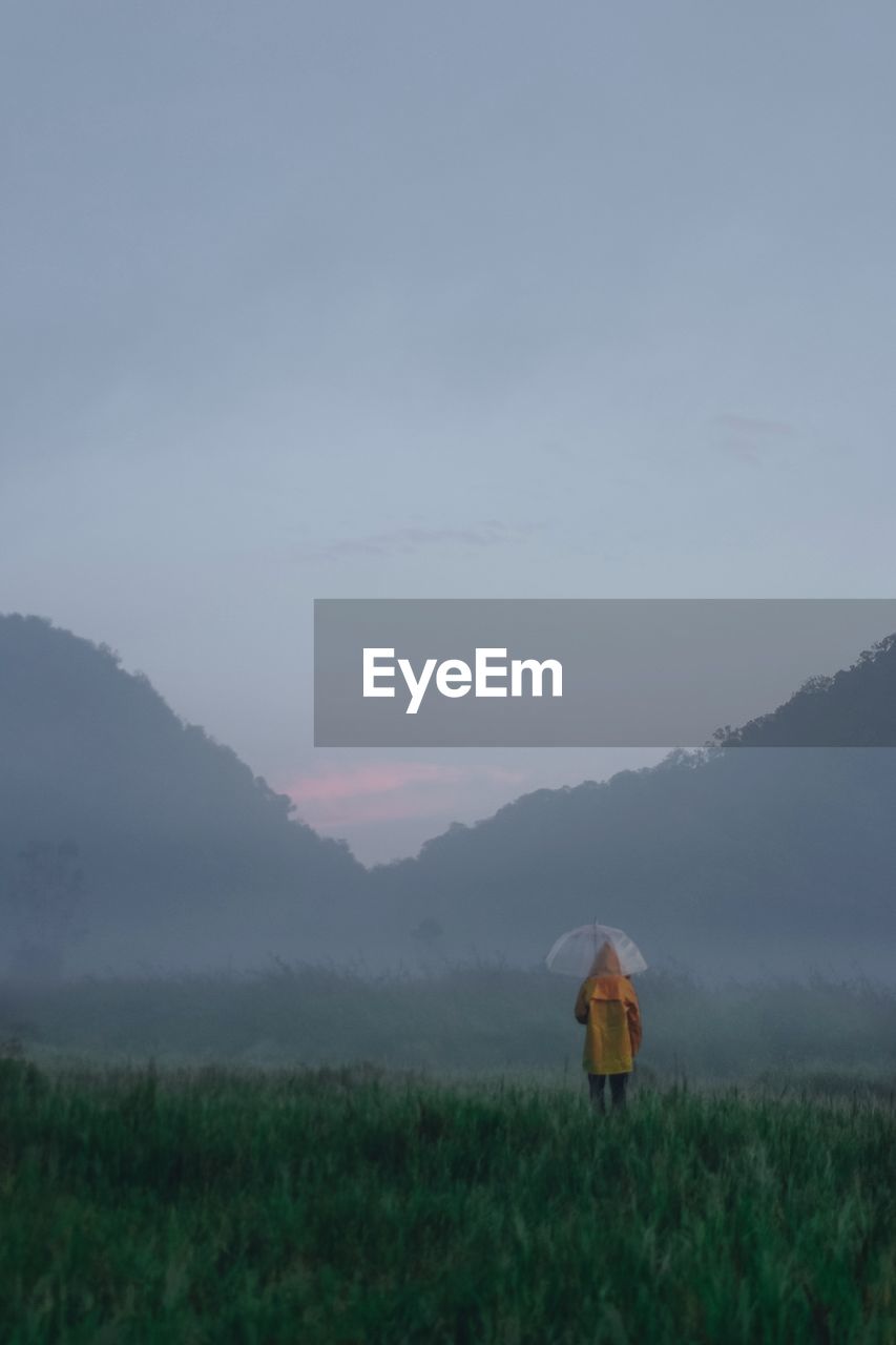 Scenic view of field against sky during sunset