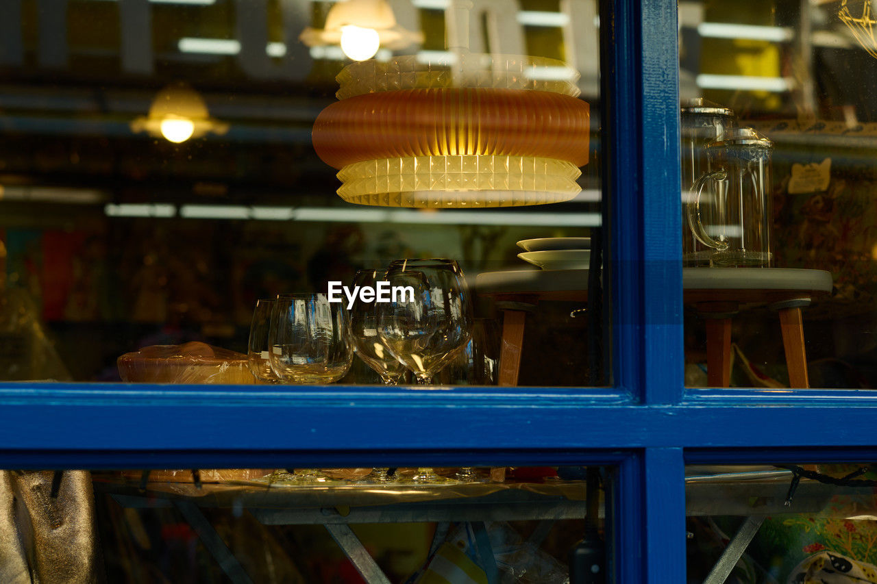 food and drink, business, indoors, no people, illuminated, food, glass, restaurant, lighting equipment, business finance and industry, shelf