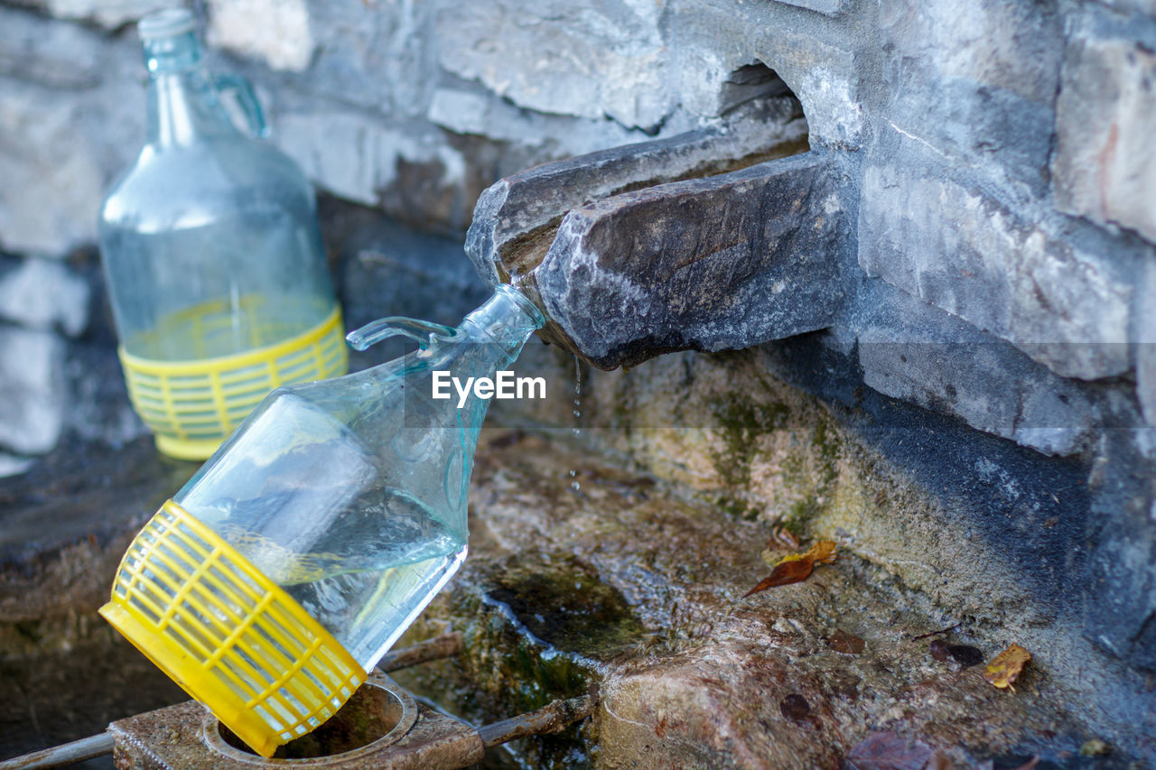 water, rock, container, bottle, ice, no people, nature, outdoors, plastic, close-up