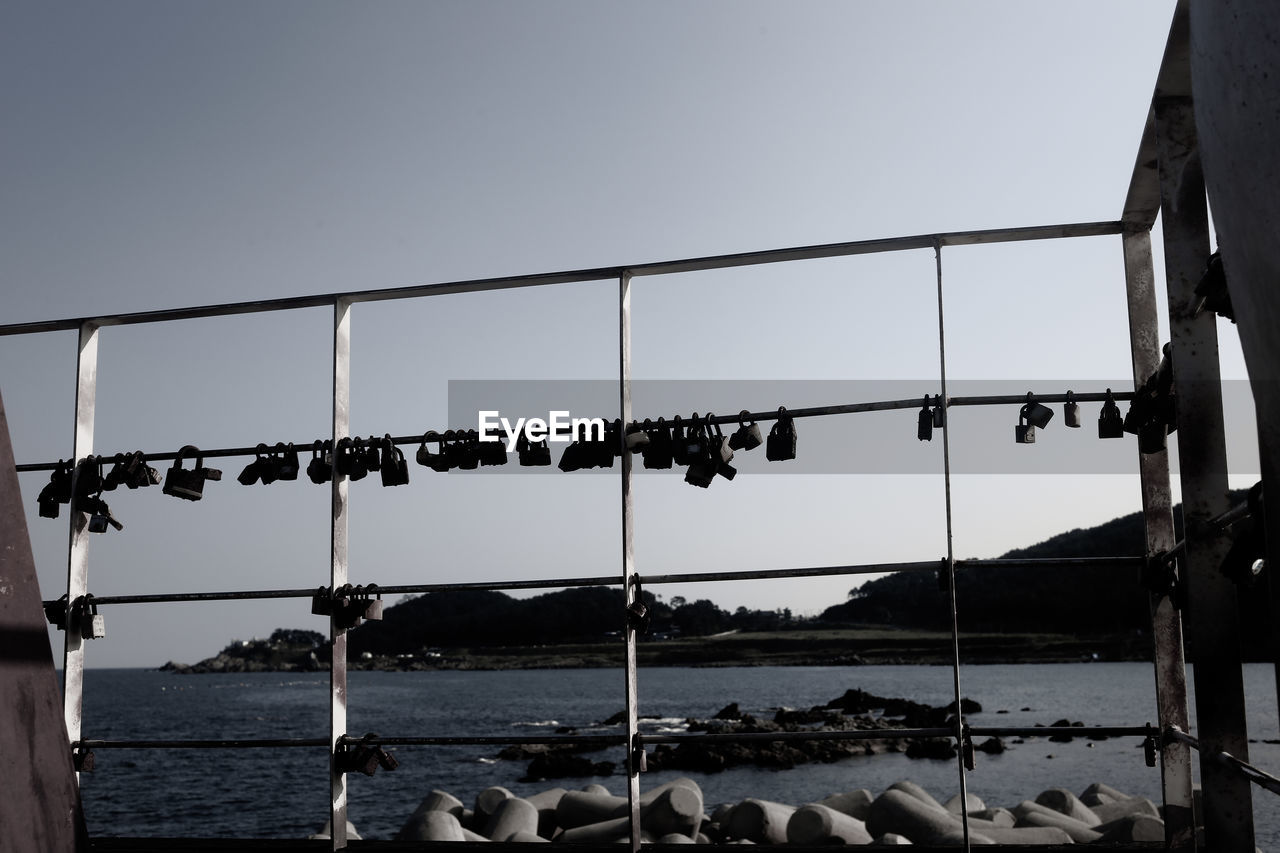 BRIDGE OVER SEA AGAINST SKY