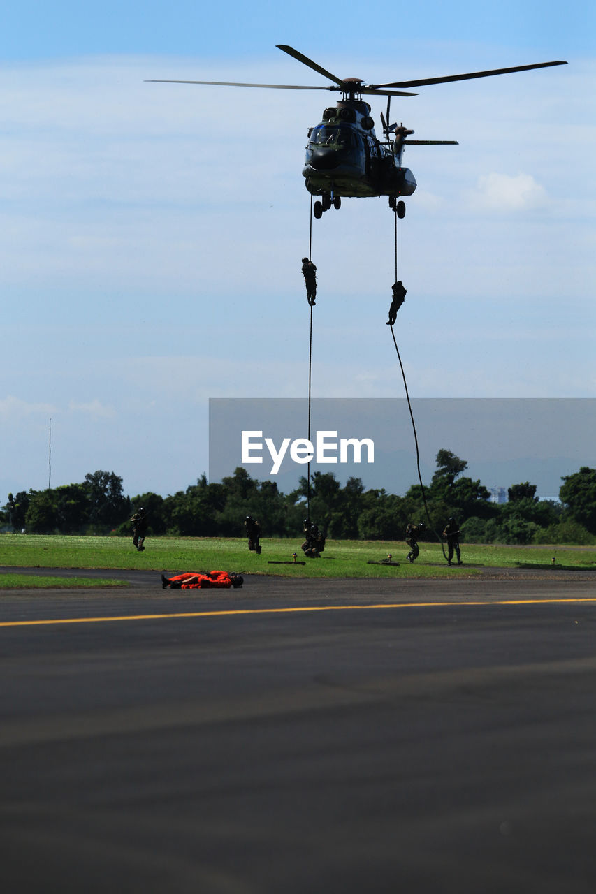 MOTORCYCLE AGAINST SKY