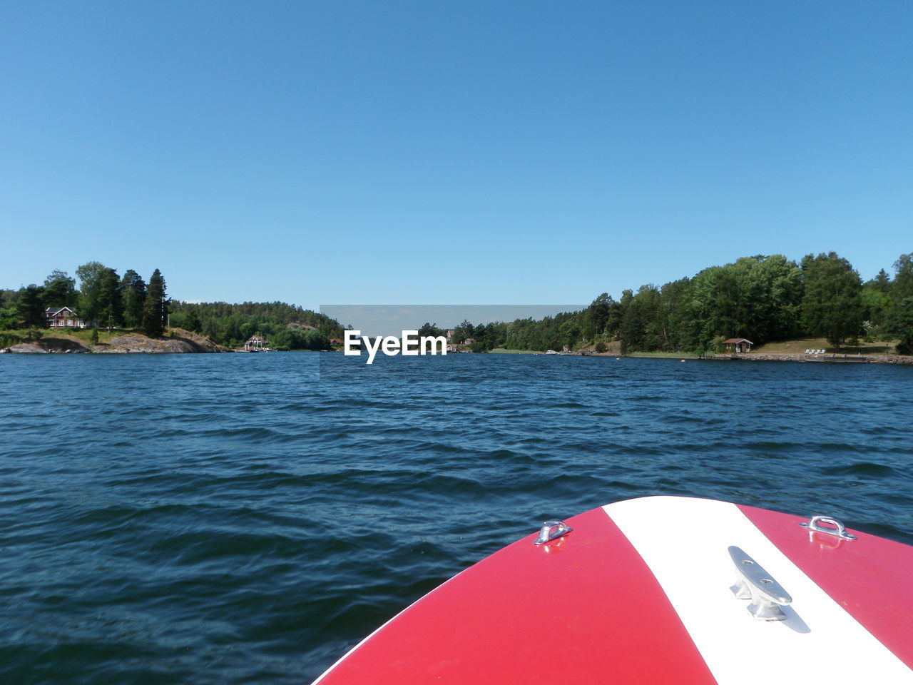 Close-up of cropped boat in calm lake