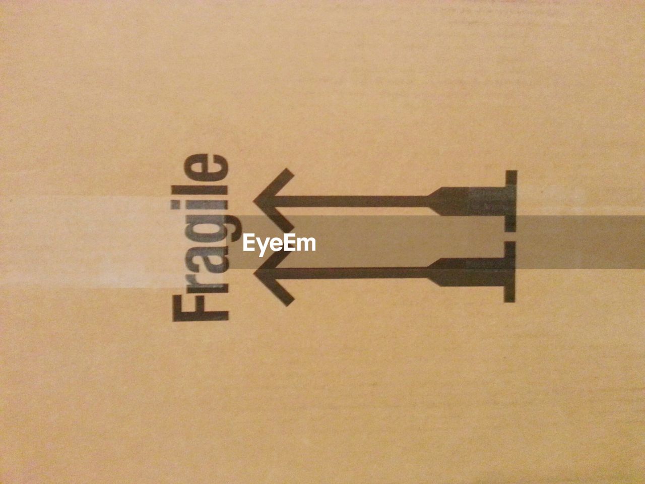 Fragile sign on cardboard box