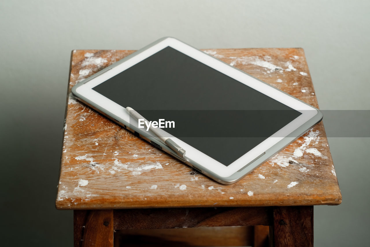 High angle view of mobile phone on table