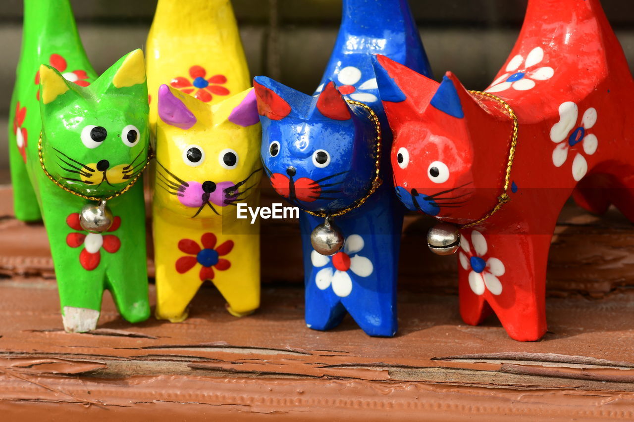 CLOSE-UP OF TOYS FOR SALE AT MARKET