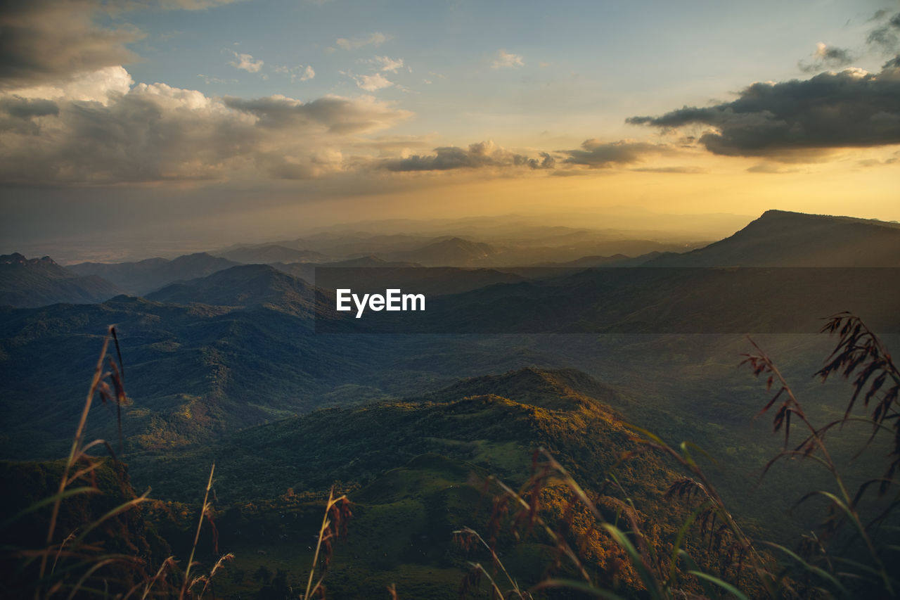 Beautiful mountain range against sunset sky in thailand