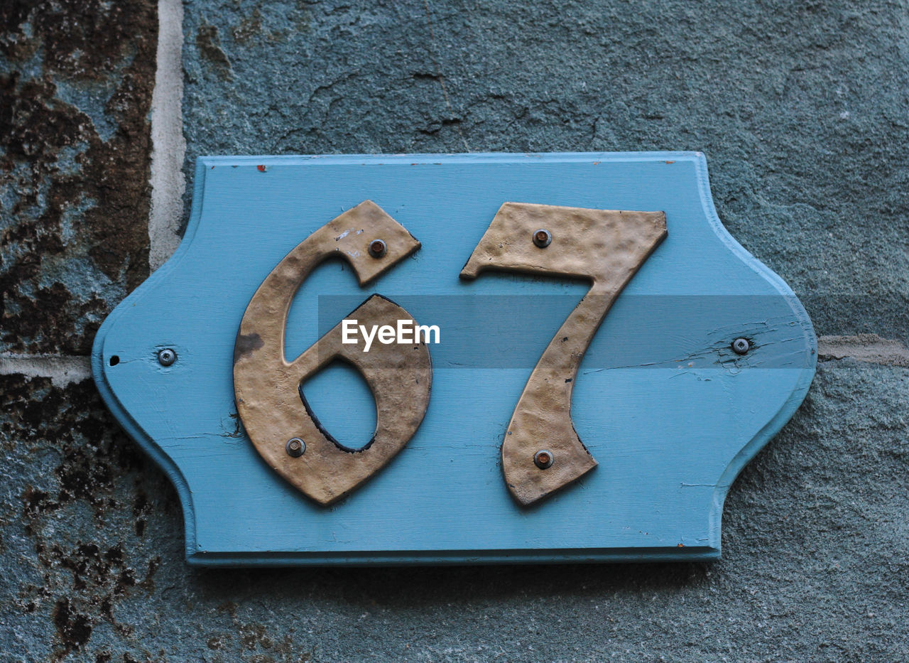 blue, number, no people, iron, text, high angle view, communication, day, wood, close-up, food and drink