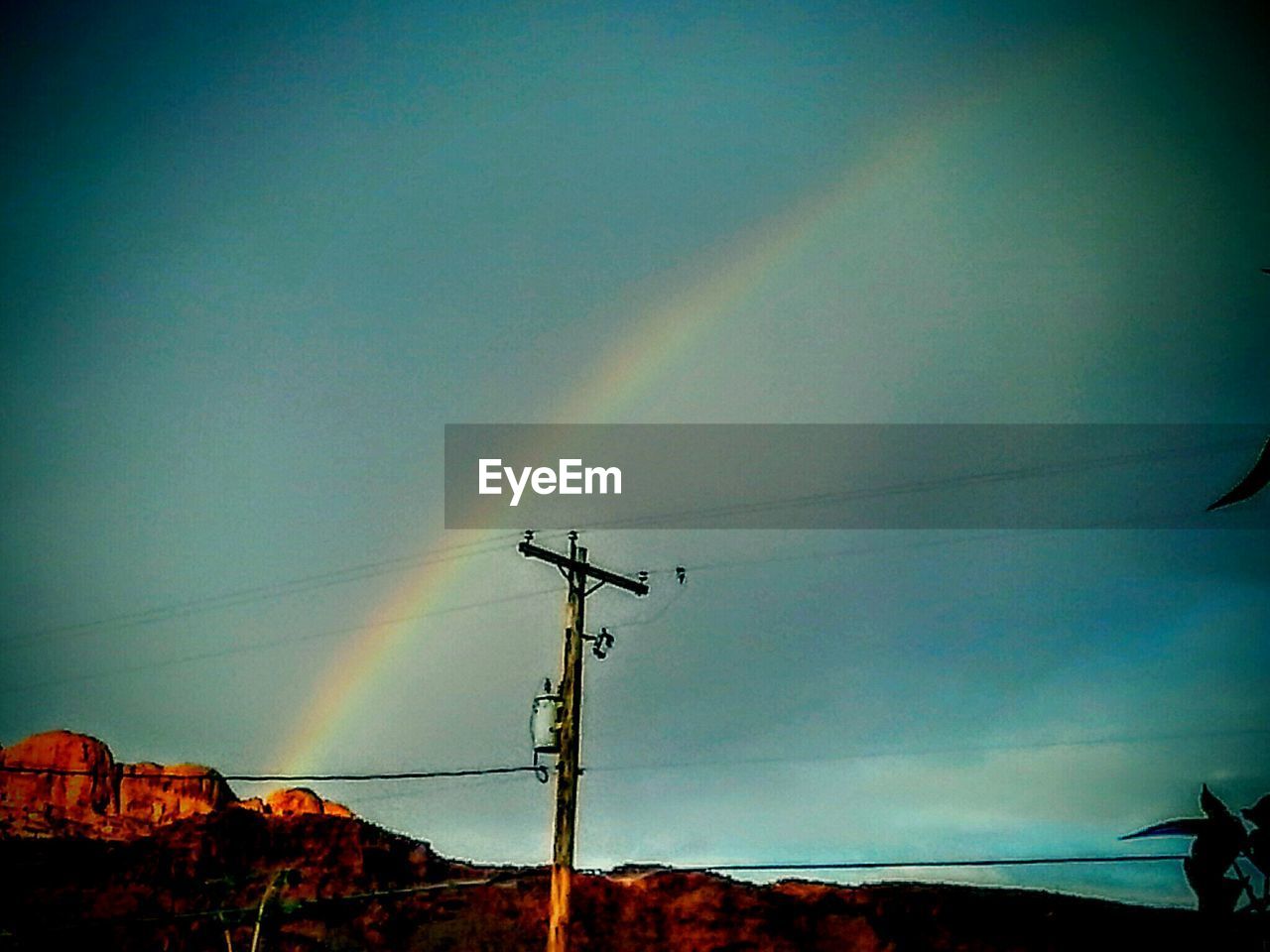 LOW ANGLE VIEW OF ELECTRICITY PYLON AGAINST SKY