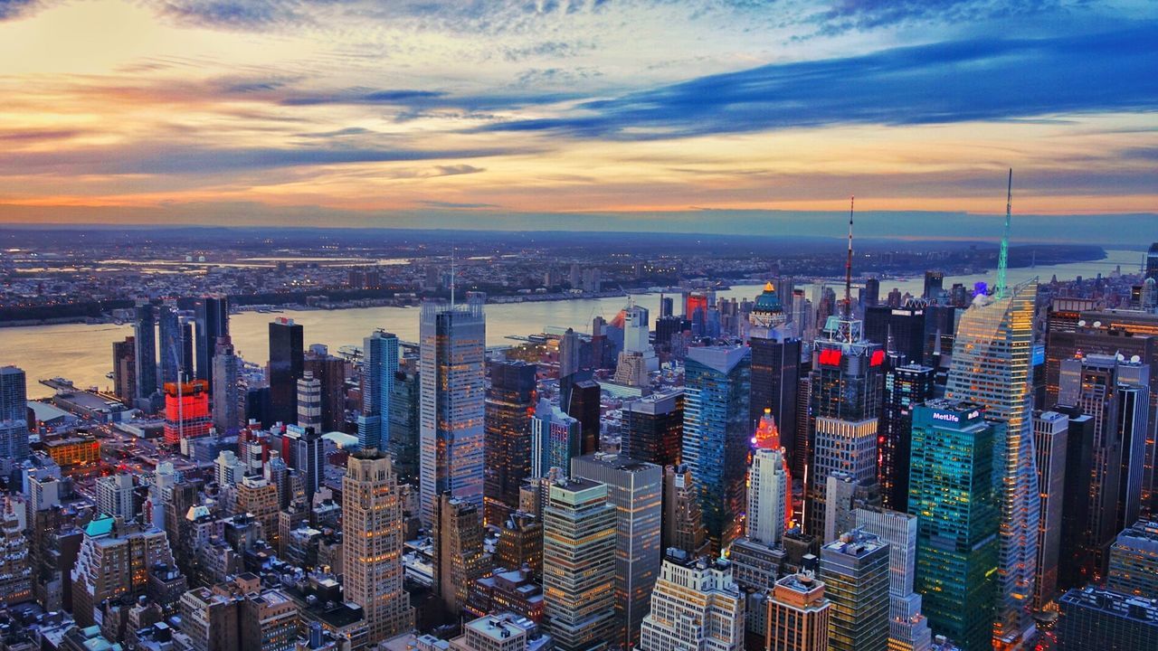 High angle view of cityscape against sky during sunset