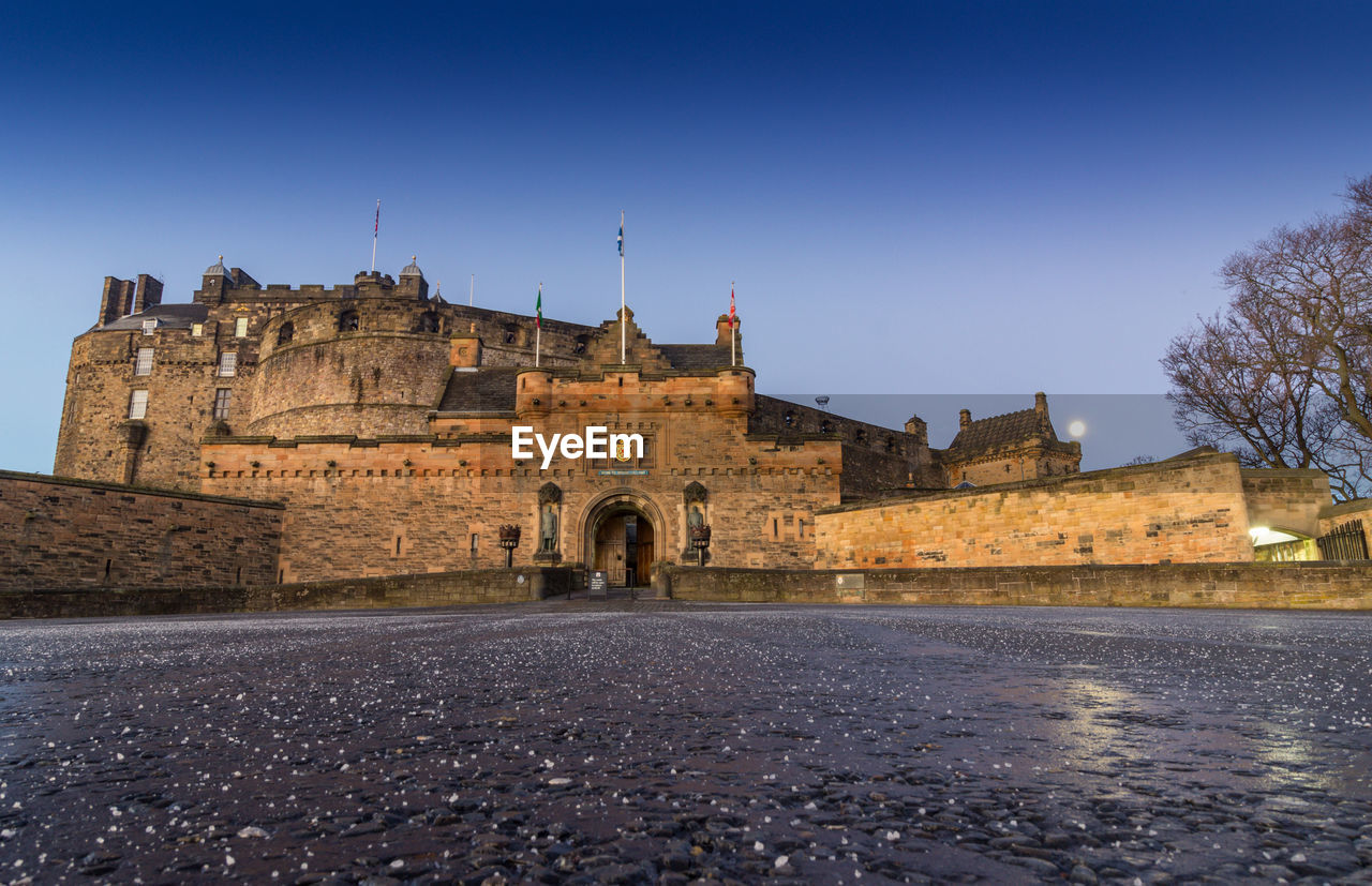 VIEW OF HISTORIC BUILDING AGAINST BLUE SKY