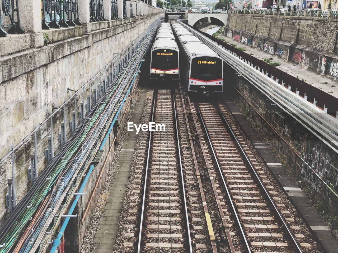 HIGH ANGLE VIEW OF TRAIN ON RAILROAD STATION PLATFORM