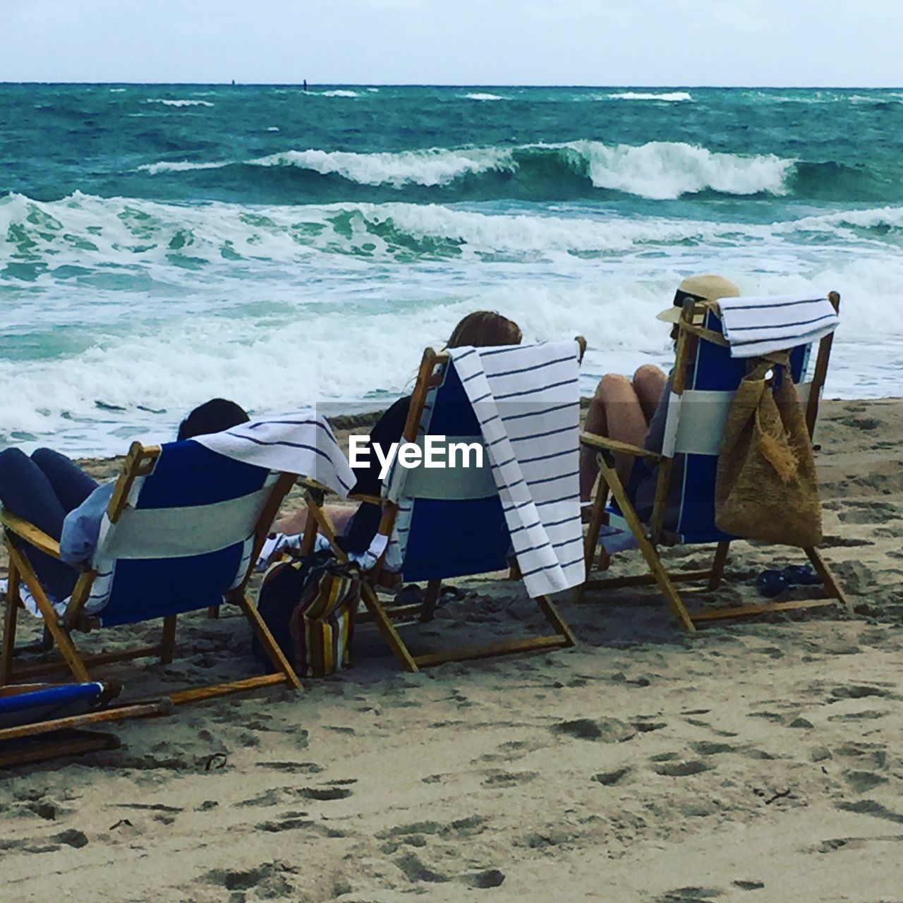 LOUNGE CHAIRS ON BEACH