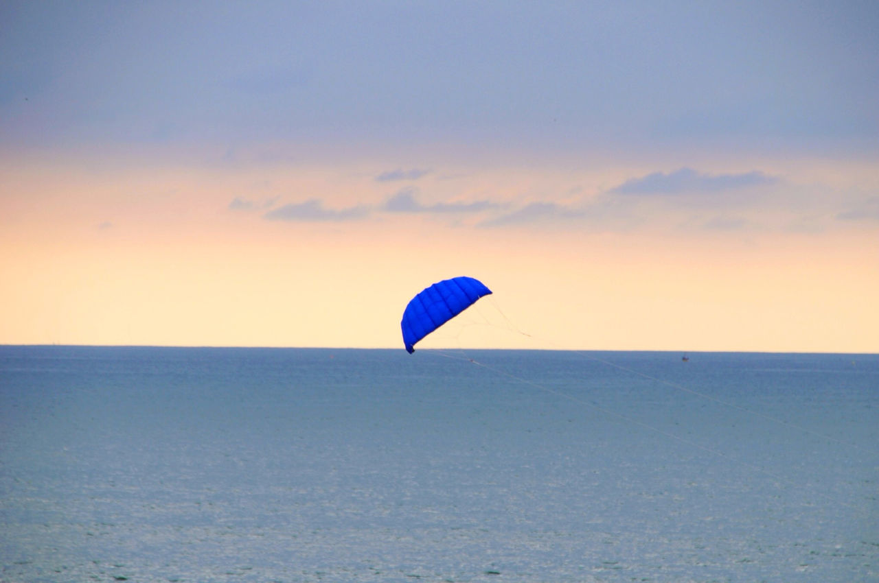 SCENIC VIEW OF SEASCAPE AGAINST CLOUDY SKY