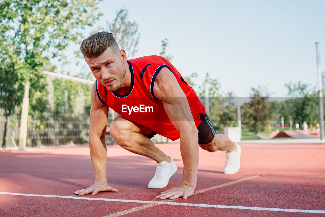 side view of woman exercising at gym