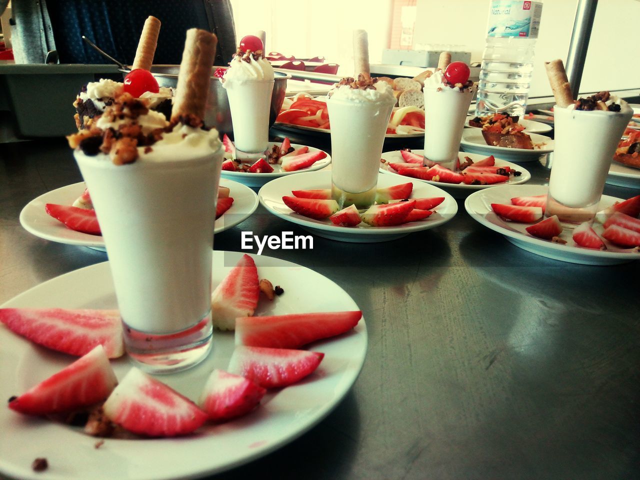 CLOSE-UP OF FRUITS SERVED ON TABLE