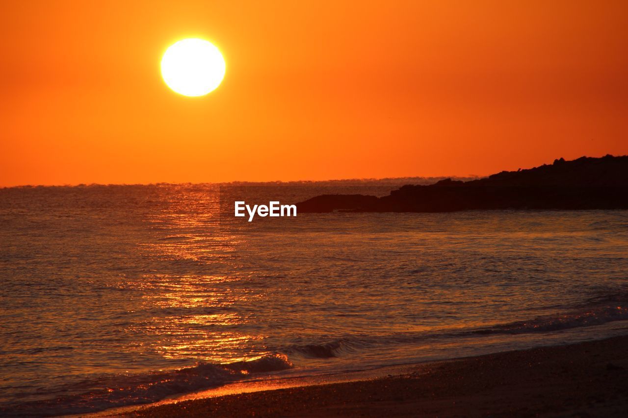 SCENIC VIEW OF SEA AGAINST ROMANTIC SKY