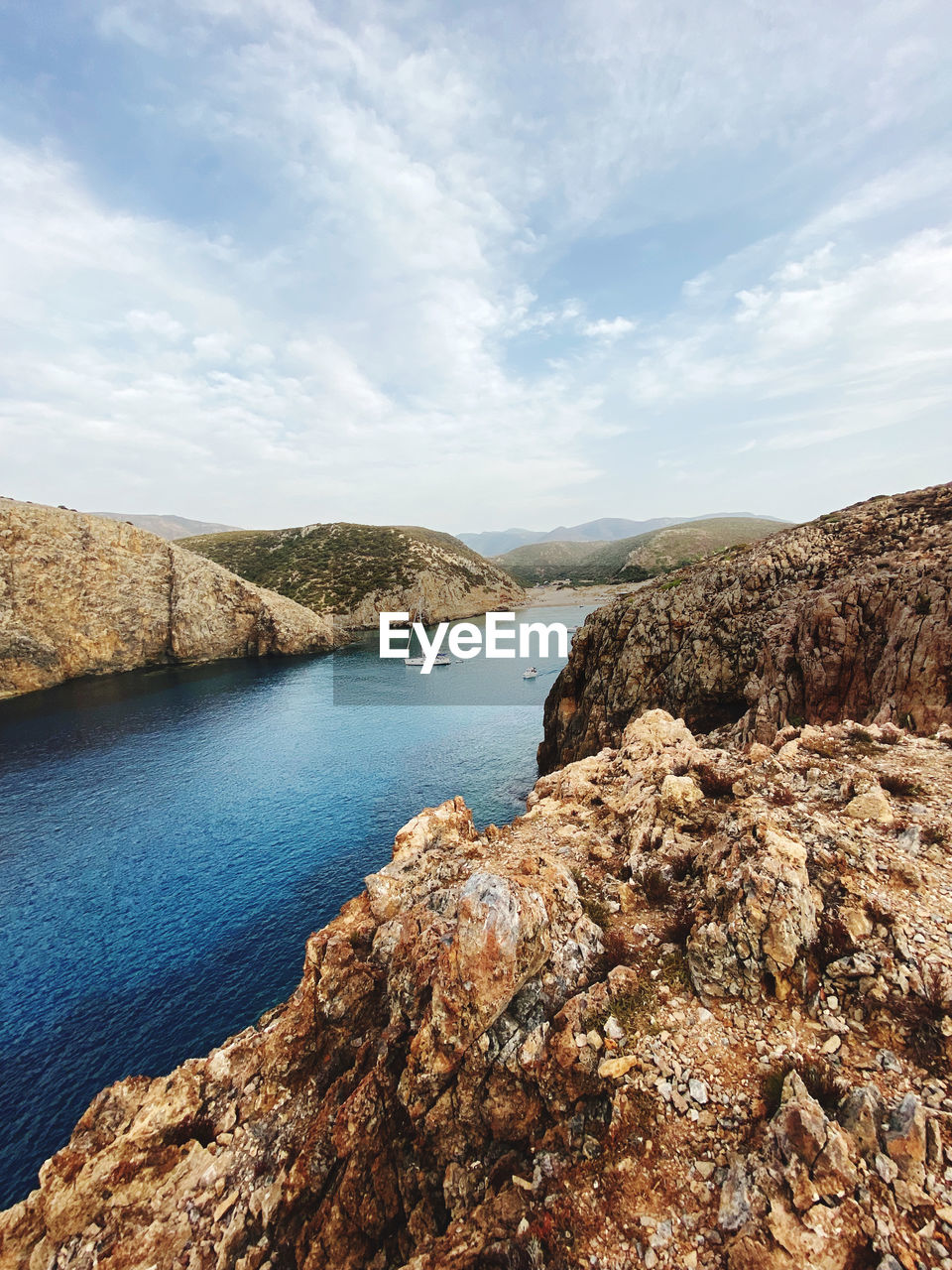 Scenic view of bay against sky