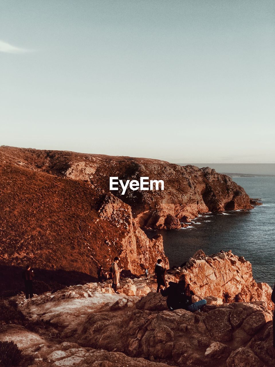 ROCK FORMATIONS BY SEA AGAINST SKY