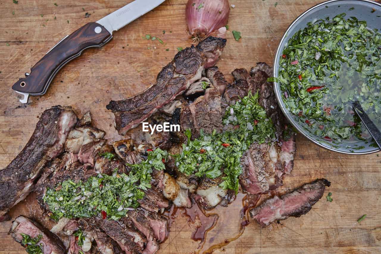 Grilled steak with homemade chimichurri sauce