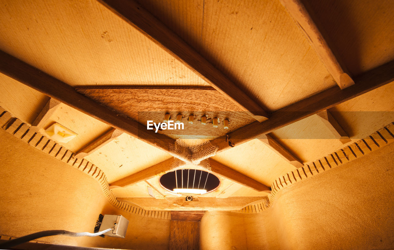 LOW ANGLE VIEW OF CEILING OF BUILDING