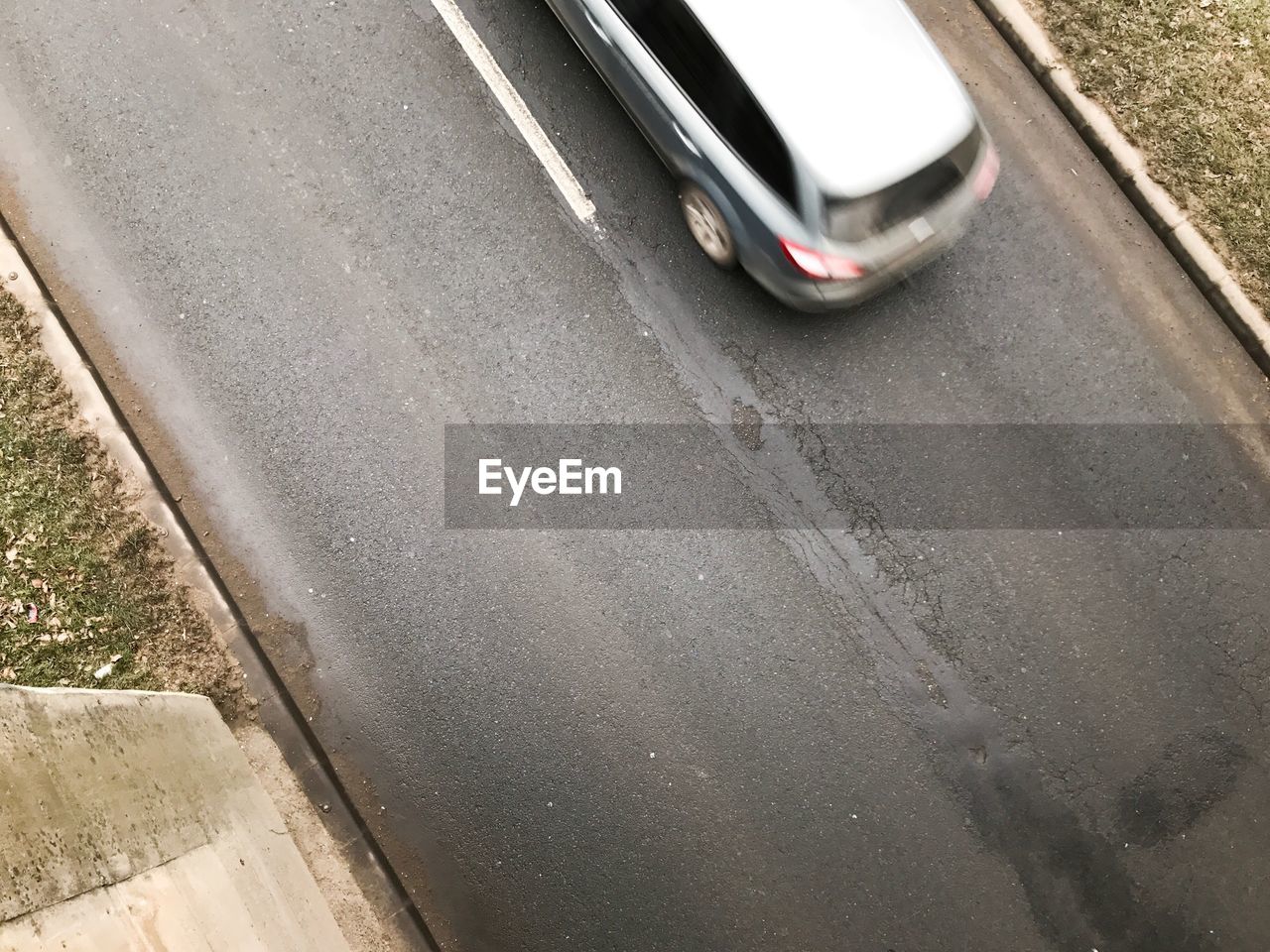 CLOSE-UP HIGH ANGLE VIEW OF CAR