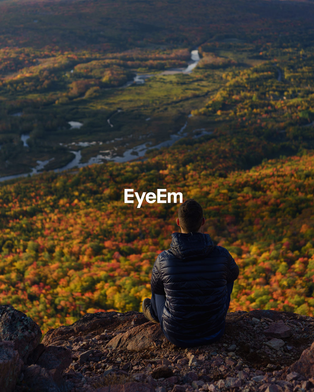 Rear view of hiker looking at view