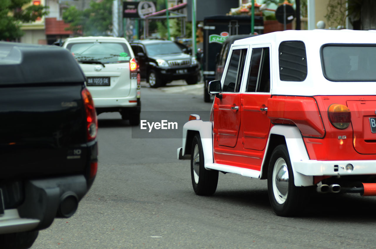 CLOSE-UP OF RED CAR