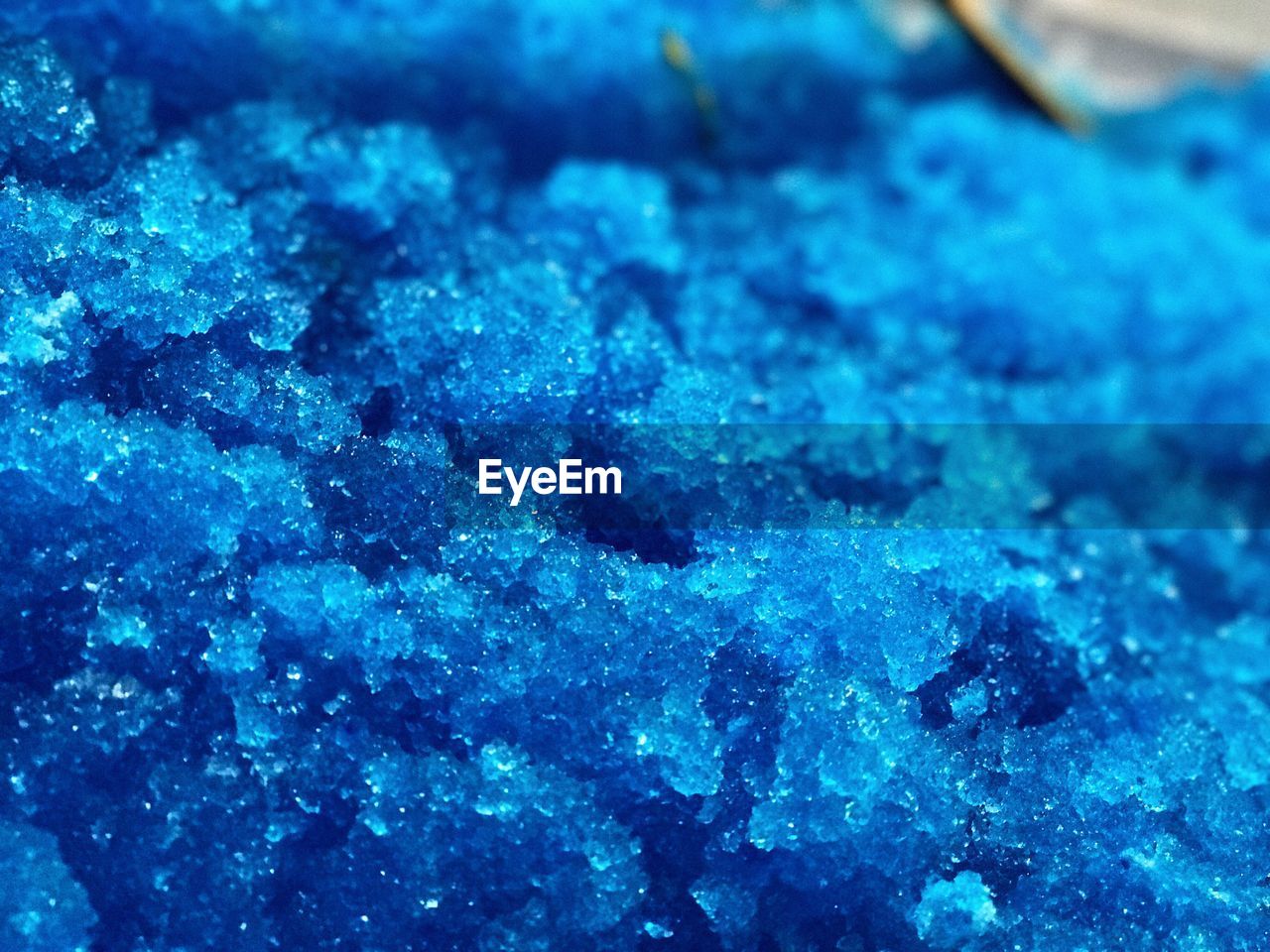 CLOSE UP OF BLUE AND SURFACE