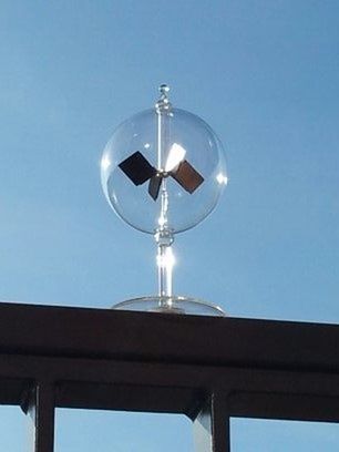 LOW ANGLE VIEW OF STREET LIGHTS AGAINST BLUE SKY