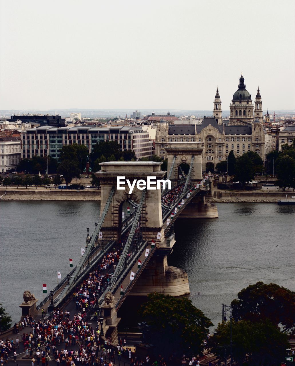 VIEW OF BRIDGE OVER RIVER IN CITY