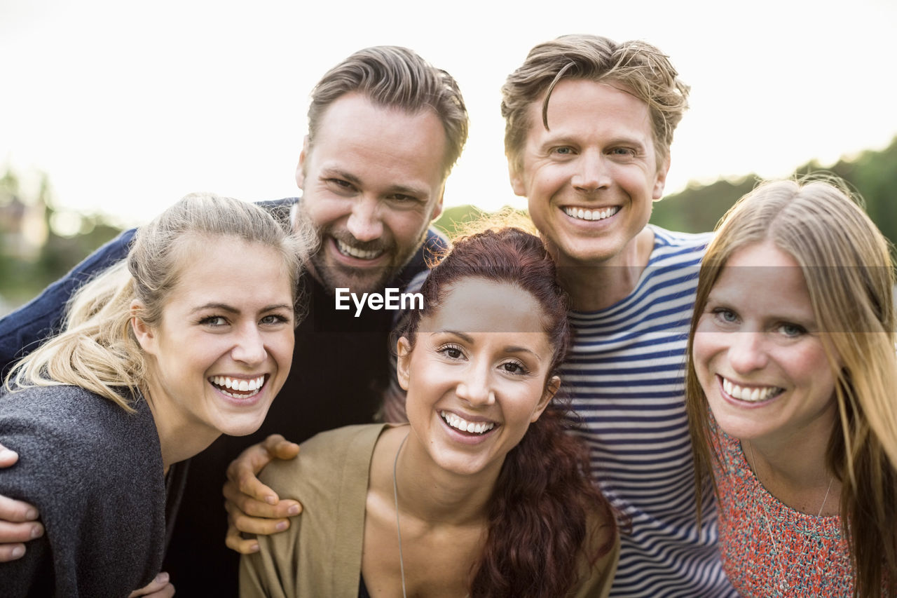 Portrait of happy friends outdoors