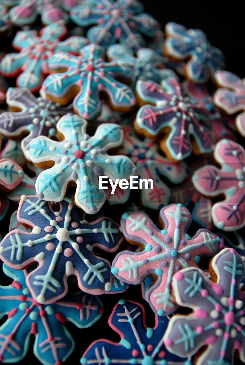 Close-up of snowflake shape christmas cookies on table
