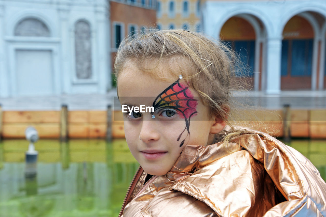 Portrait of girl with face paint