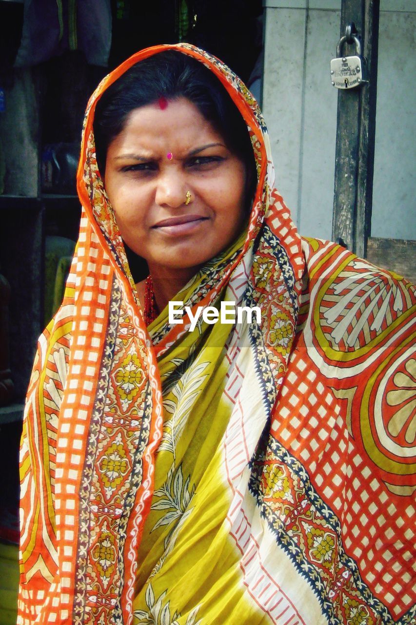Portrait of smiling woman in sari