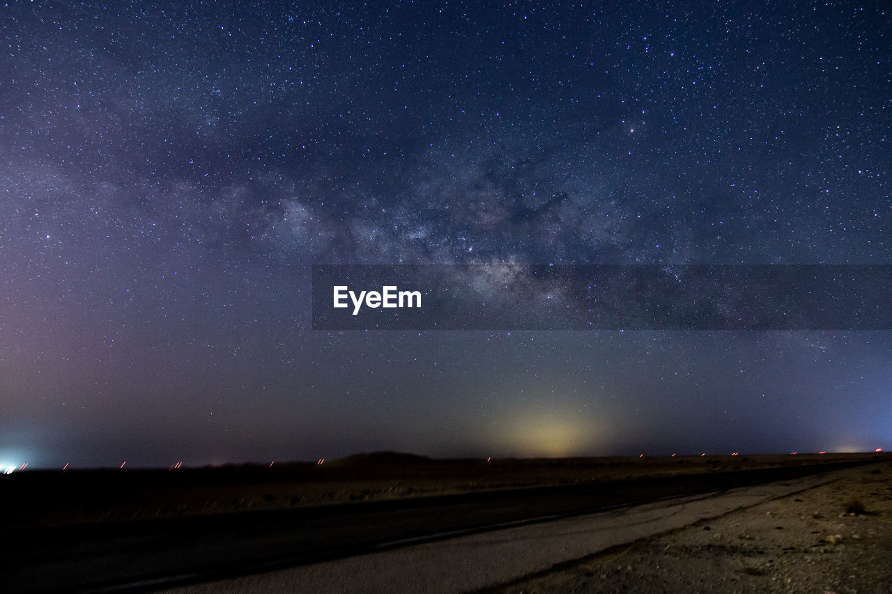 SCENIC VIEW OF STAR FIELD AGAINST SKY AT NIGHT