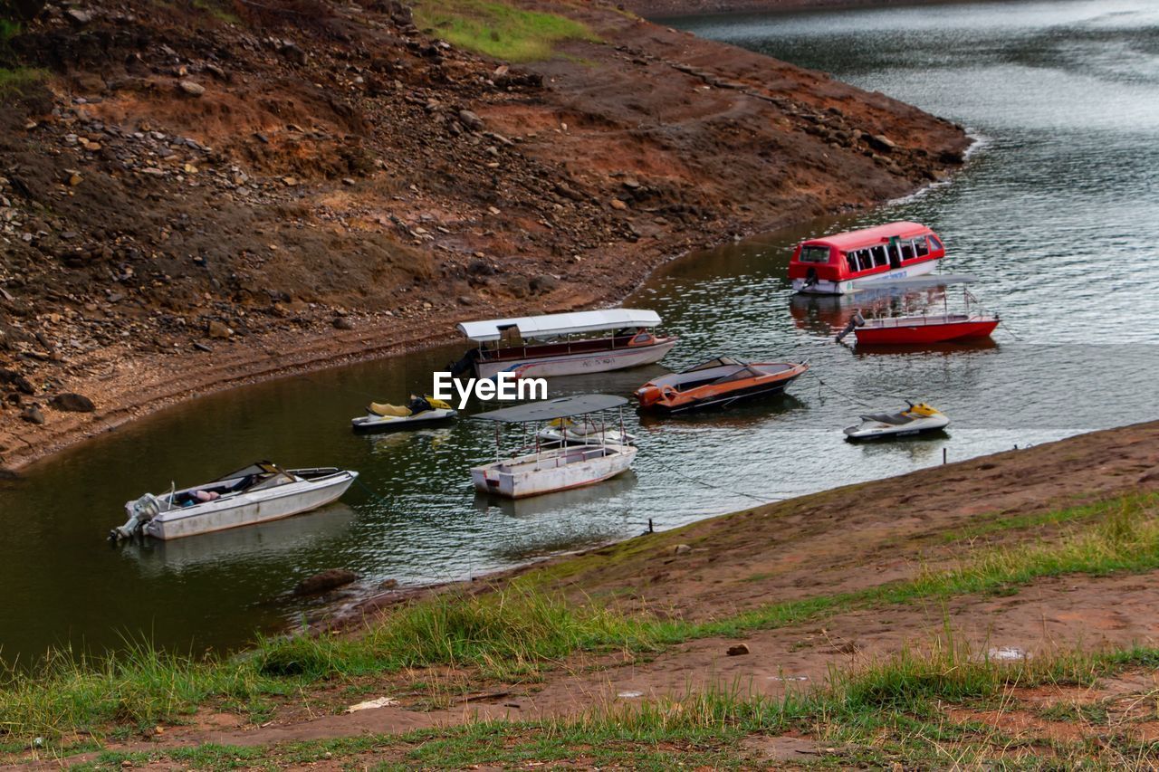 High angle view of boats moored on shore