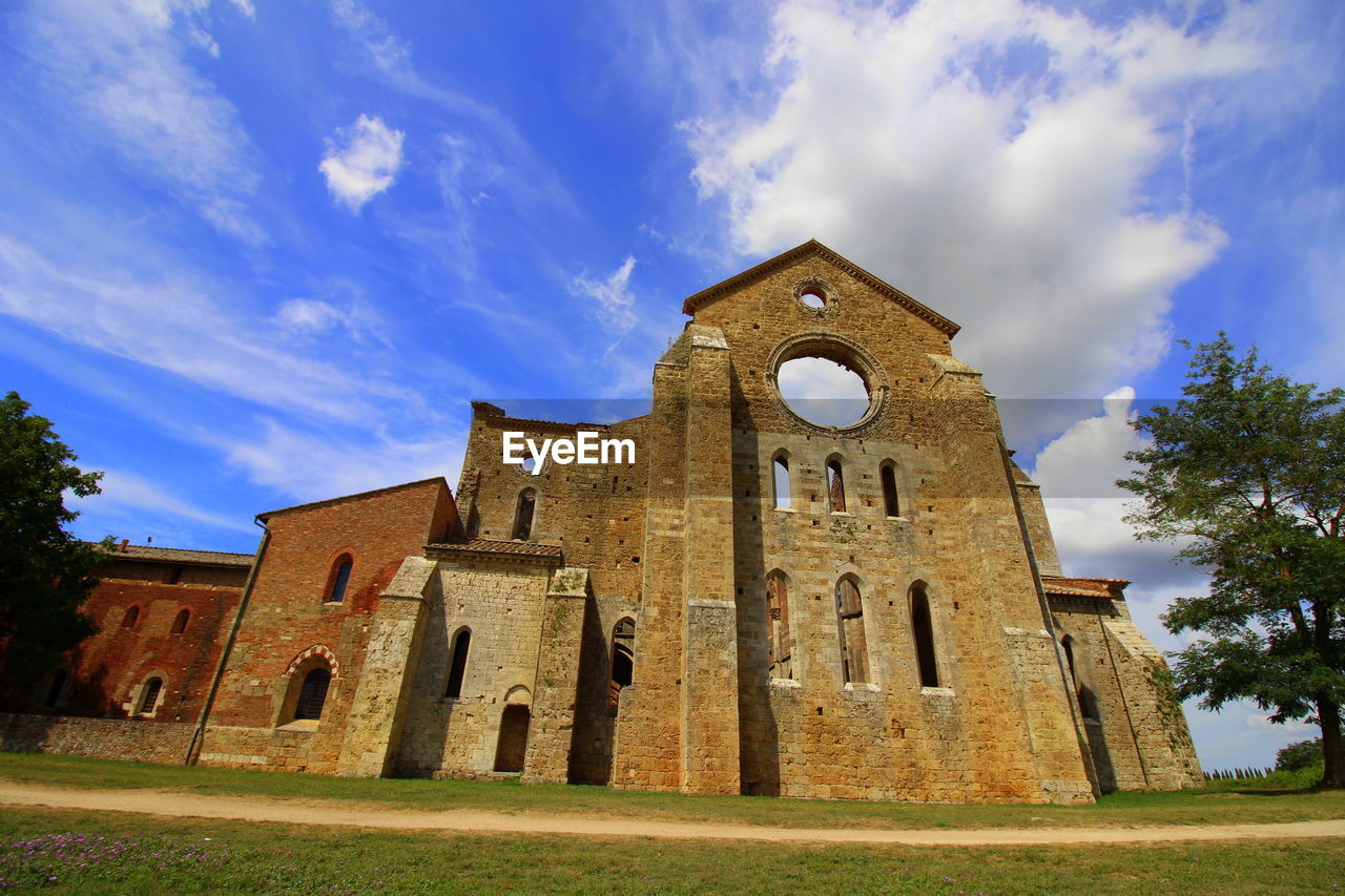 Low angle view of old building against sky