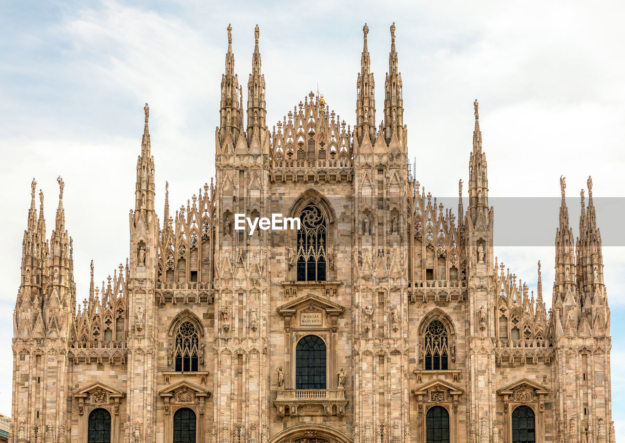 Front view of facade of duomo di milano - one of the largest cathedrals in the world, milan, italy