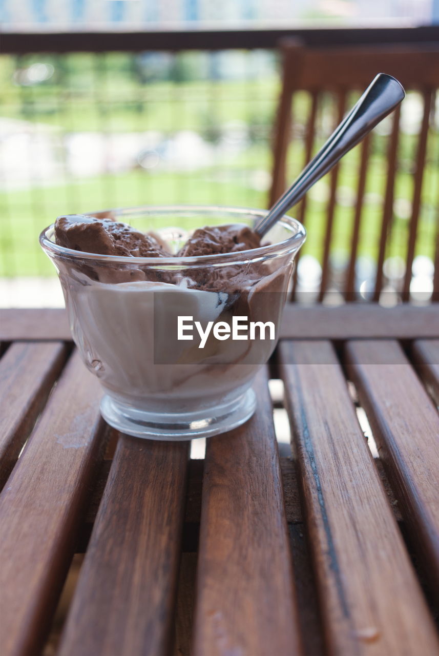 Close-up of ice cream in glass on table