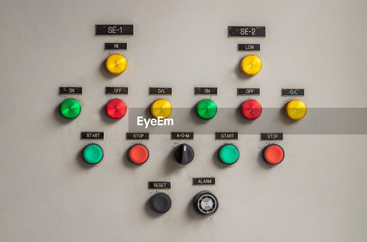 Close-up of multi colored push buttons